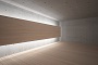 室内壁：コンクリート打ち放し面の上に、木材壁面を構築し間接照明を組み込む